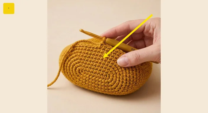 Oval crochet bag base with a marked back-loop turning ridge
